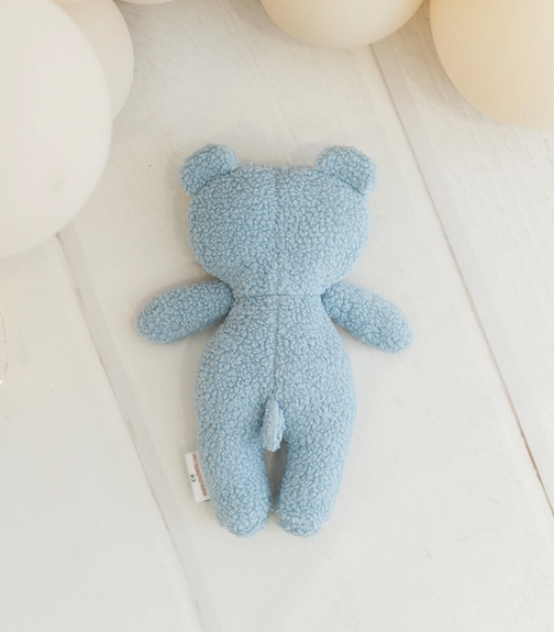 Ourson en peluche bleu ciel
