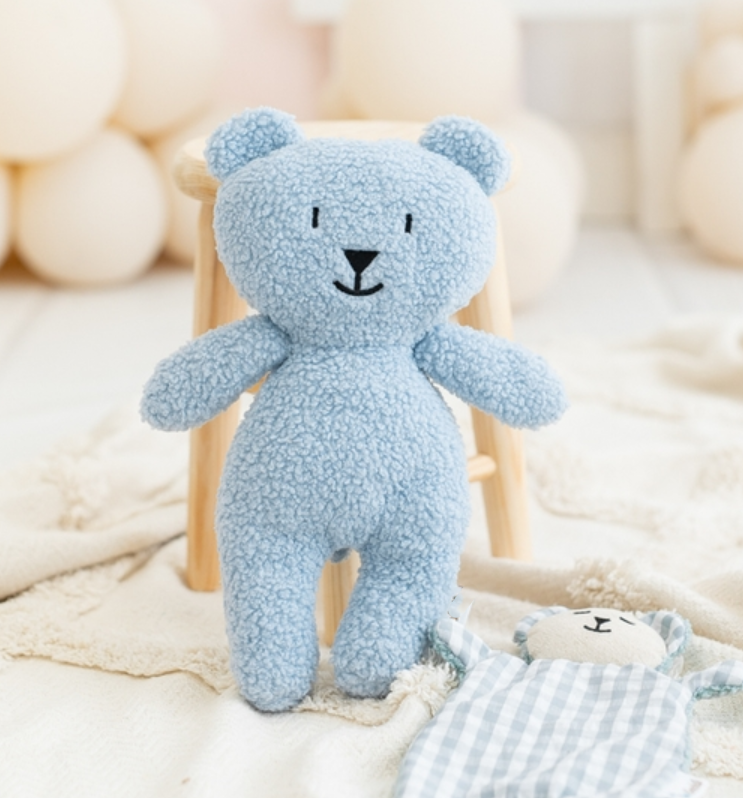 Ourson en peluche bleu ciel