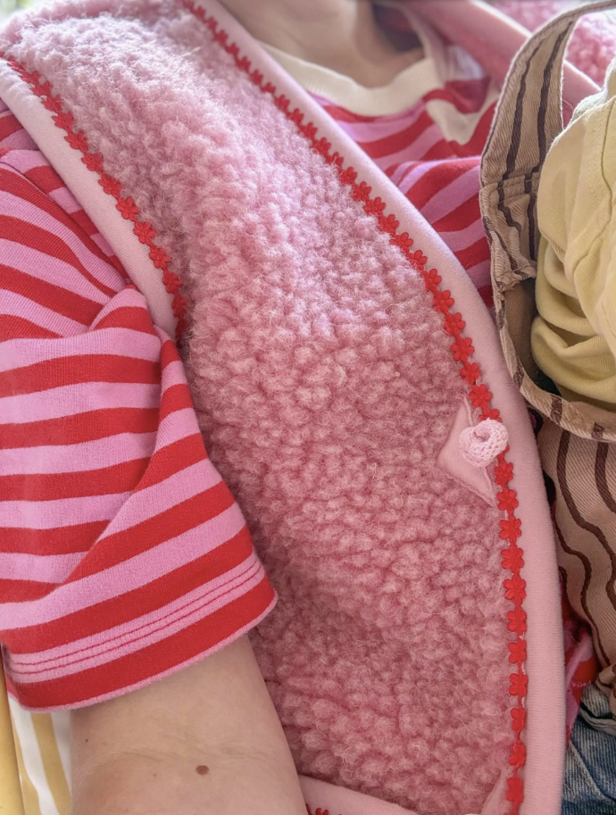 Gilet en 100% laine merinos rose rouge